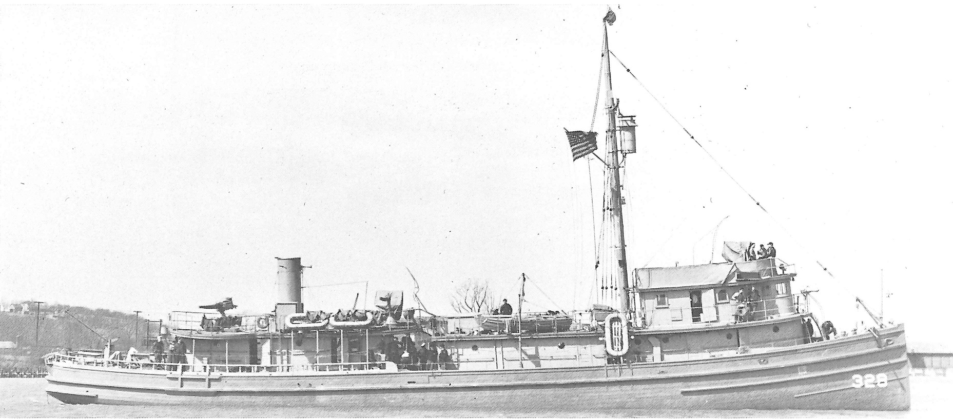 Photo of Dow’s sister cutter EM Rowe complete with mast lookout used for spotting schools of Menhaden during its former career. (U.S. Coast Guard)