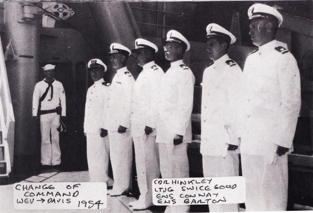 Black and white photo of the 1954 change of command ceremony on board the Coast Guard Cutter Courier under sunny Greek skies. (The crew of the Coast Guard Cutter Courier, as collected by the Coast Guard Cutter Courier/VOA Association)