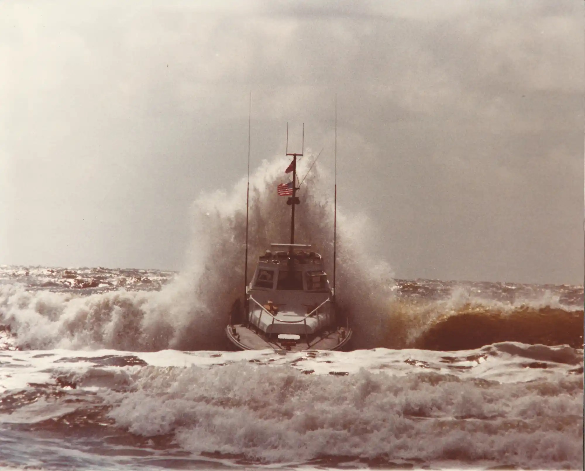 A 44-foot utility boat underway in following seas similar to conditions during Petty Officer 1st Class Richard Dixon’s famed rescues. (U.S. Coast Guard)