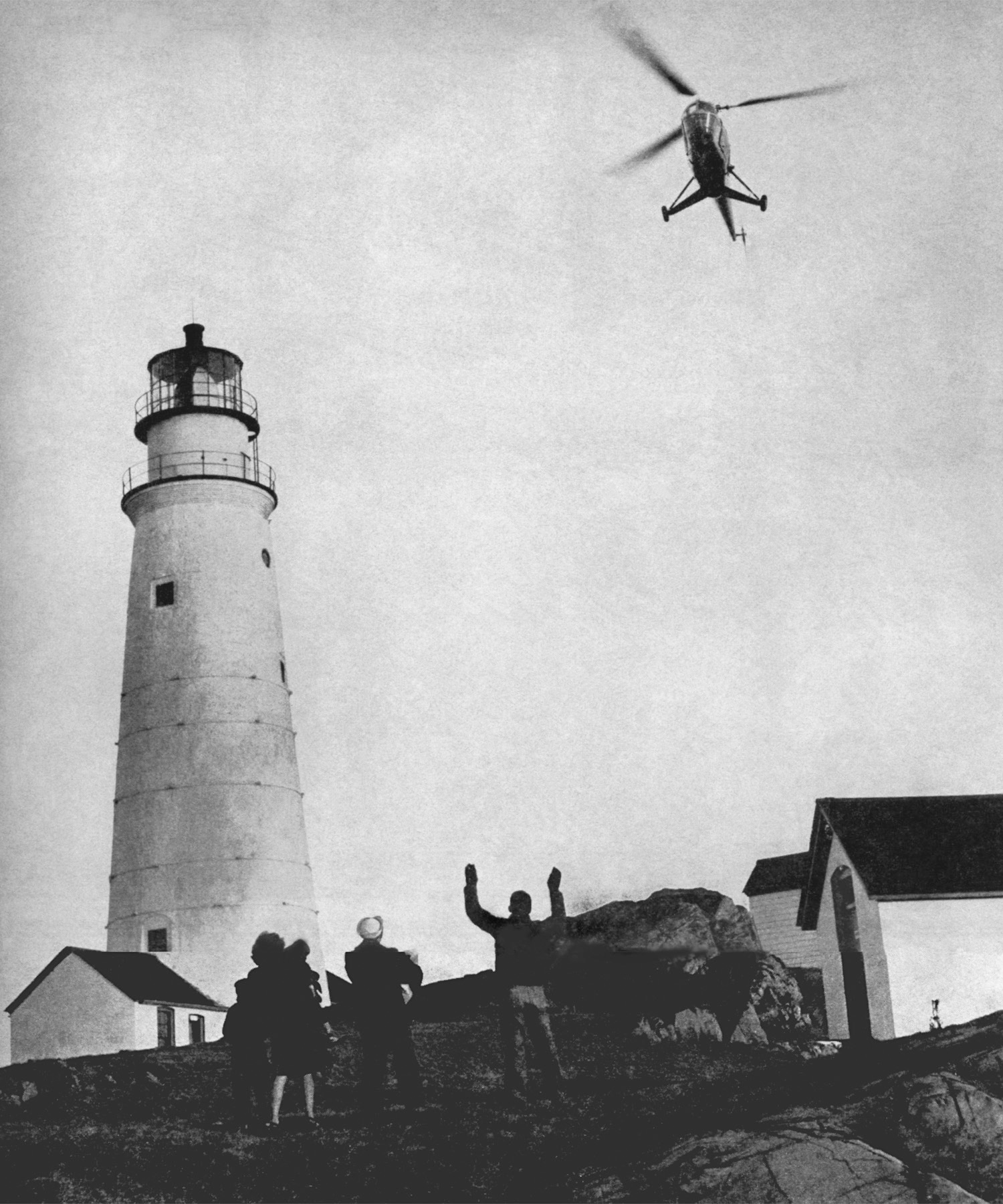 Flying Santa delivering parcels by helicopter, 1946. (Courtesy U.S. Coast Guard)
