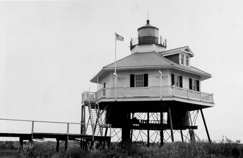 A common screw-pile lighthouse located near Keeper Haines’s lifesaving station; the Fort Point Lighthouse barely survived the Great Galveston Hurricane. (U.S. Coast Guard Photo)