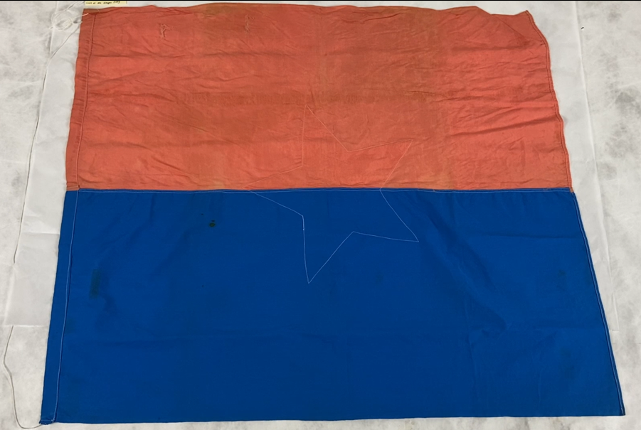 7)	Reverse side of the Vietcong flag (U.S. Coast Guard Heritage Asset Collection # 2014.084.001) with no star. (Courtesy of the author)