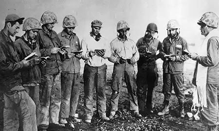 Lt. Roland Gittelsohn, first Jewish Marine Corps chaplain, with the marines at Iwo Jima. (jewishvirtuallibrary.org) Lt. Roland Gittelsohn, first Jewish Marine Corps chaplain, with the marines at Iwo Jima. (jewishvirtuallibrary.org)