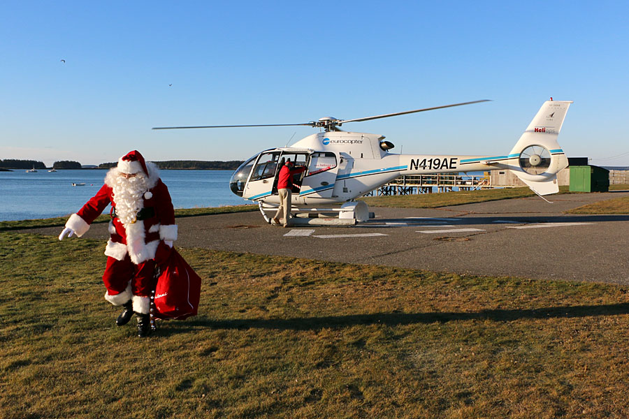7.	Flying Santa visiting Station Jonesport, Maine, 2015. (Courtesy Friends of Flying Santa)