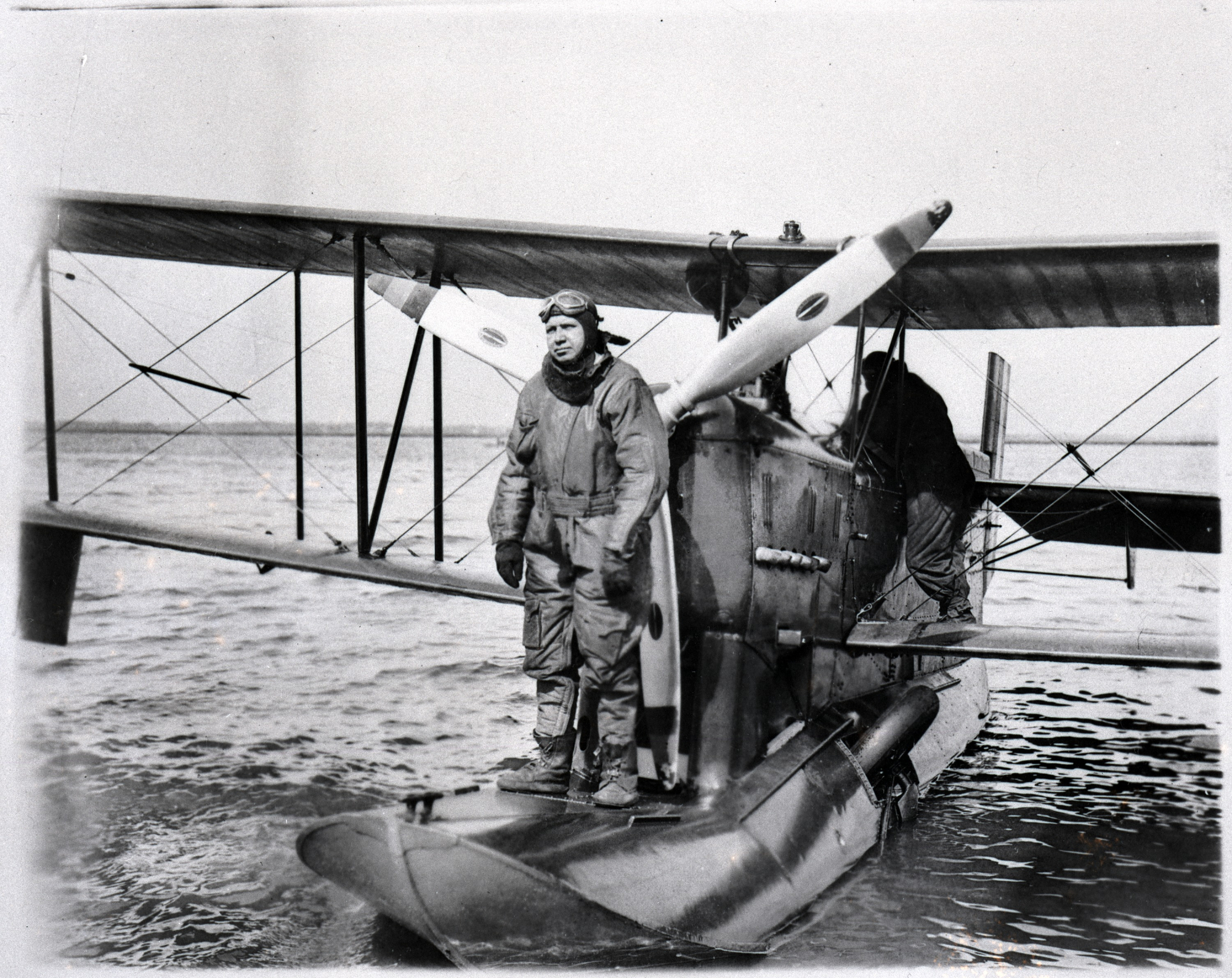 7.	Coast Guard enlisted aviator Charles Thrun perched on the pontoon of a Loening OL-5 during aerial patrols out of Massachusetts. (Coast Guard Aviation Association)