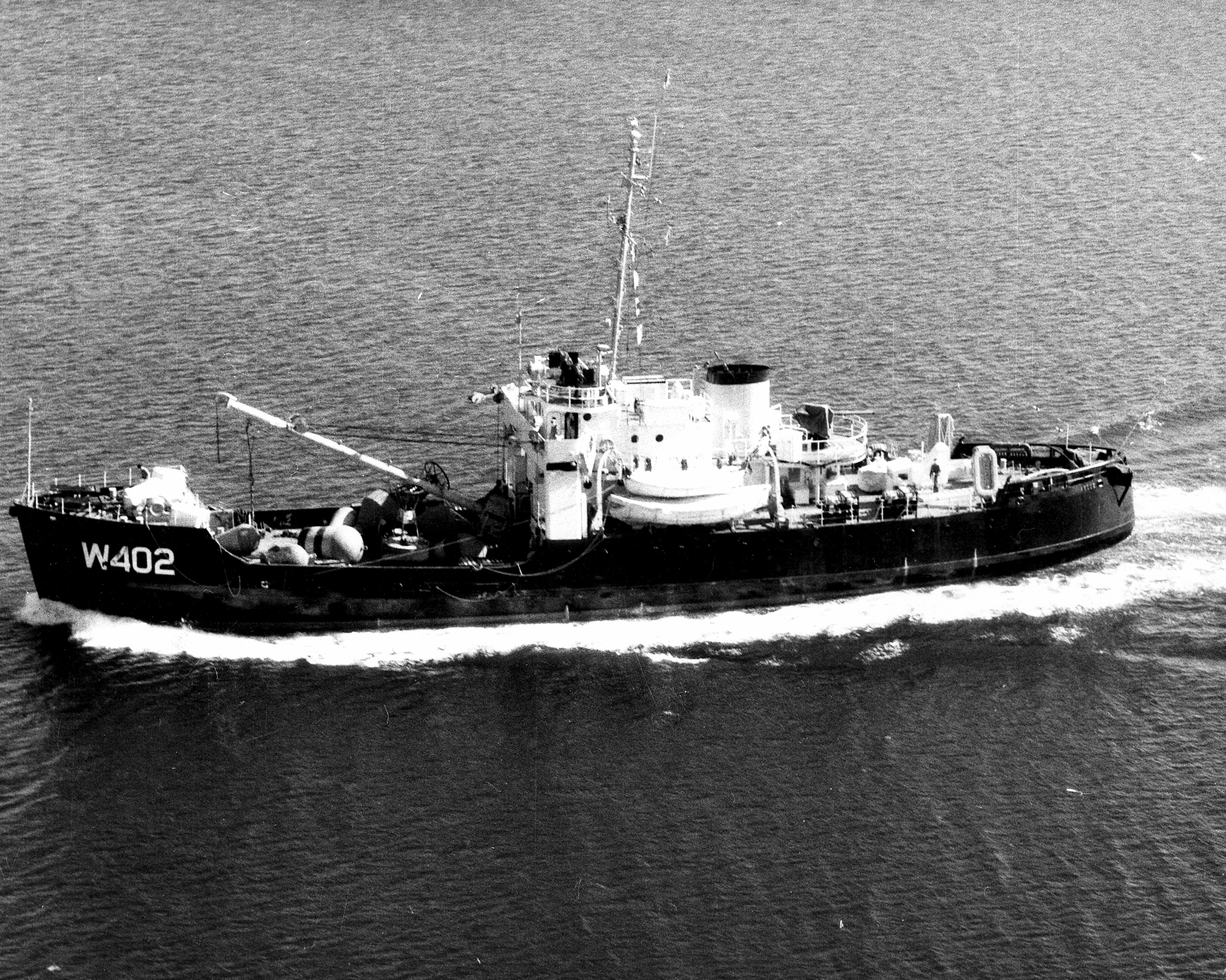 9.	Coast Guard Cutter Sedge underway at a date prior to earthquake. Sedge, a buoy tender, took to the bottom of a 60-foot channel when the earthquake caused the tsunami. (USCG)