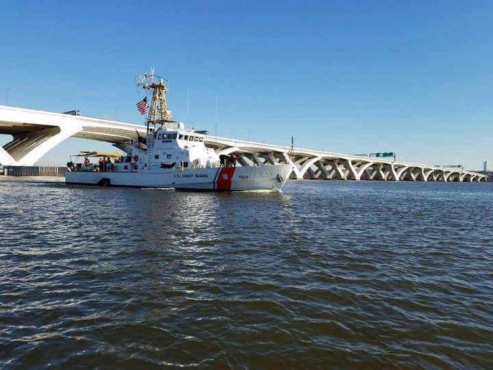 The Coast Guard Cutter Cushing sails under the Woodrow Wilson Bridge in Washington, D.C., January 2017. The Cushing was in the Greater D.C. area in support of the presidential inauguration. ,  (Photo courtesy Lt. Cmdr. Mario Gil)