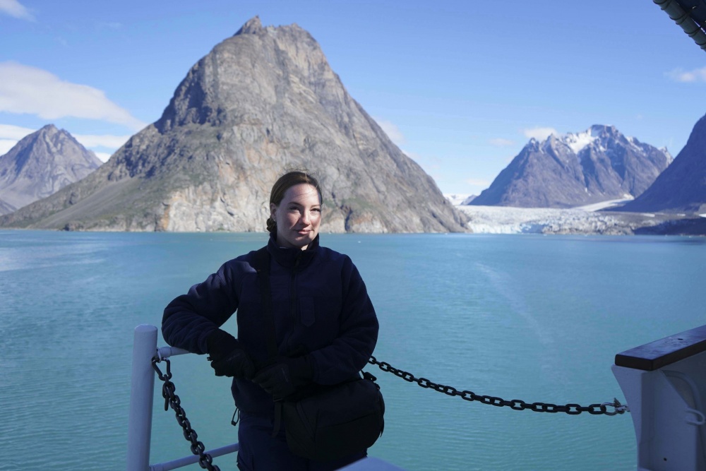 Seaman Katlin Kilroy strands for a photo while aboard the USCGC Campbell (WMEC 909) off Greenland, Aug. 15, 2020. Kilroy served as a public affairs specialist covering Arctic operations. (U.S. Coast Guard photo) 