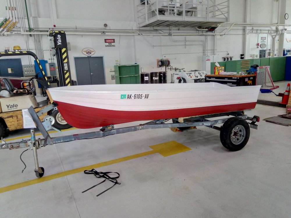 AFTER: A 12-foot johnboat on a trailer in the hangar at Coast Guard Air Station Sitka in the summer of 2020