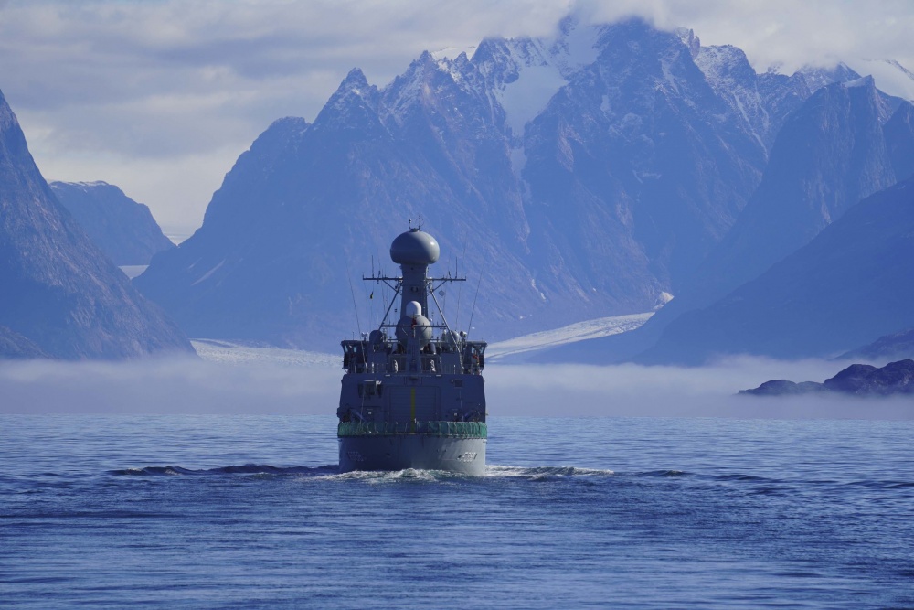 The HDMS Triton (F358), a Royal Danish navy vessel, approaches Greenland as seen from the U.S. Coast Guard Cutter Tahoma (WMEC 908), Aug. 15, 2020. Both vessel crews are participating in the 10th year of Operation Nanook. (U.S. Coast Guard photo by Seaman Kate Kilroy/Released)