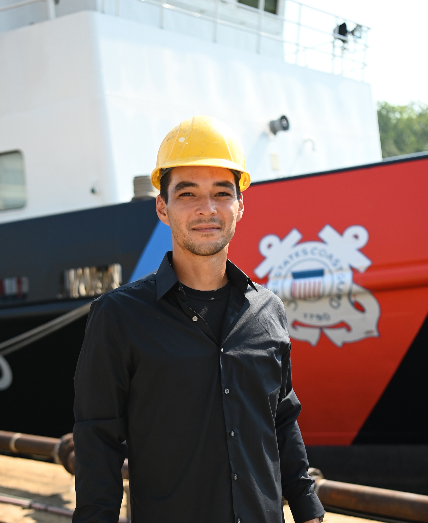 Travis Tangert has worked at the Coast Guard Yard in Baltimore as a painter/blaster for nearly two years. His duties range from blasting the boats to prepping to painting and cleaning up. He helps maintain and repair various cutters—pretty much every boat there. Tangert has also been involved in charity work at the Yard. He initially applied to the service at the urging of a former coworker, after he decided that a culinary career did not offer the work-life balance necessary to raise his daughter as a single dad.