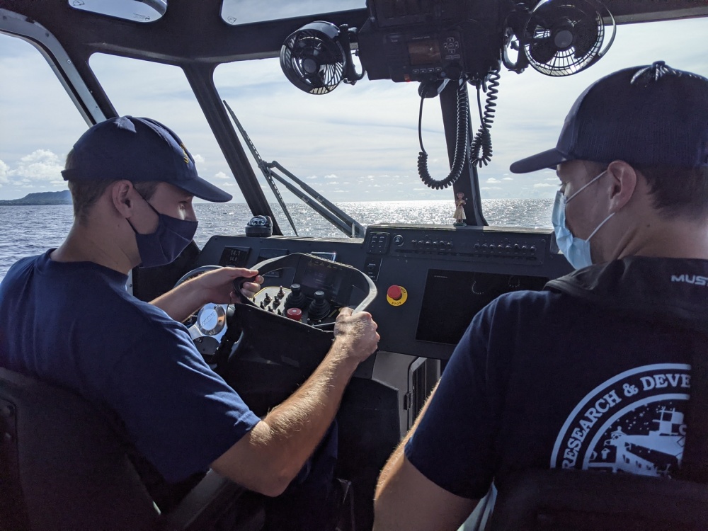 Coast Guard service members conduct a test of an unmanned surface vehicle off Oahu, Hawaii, Nov. 2, 2020. The focus of the test was to explore how current and emerging technologies might be used to enhance maritime domain awareness in remote regions. (U.S. Coast Guard photo courtesy of the Coast Guard Research and Development Center/Released) 